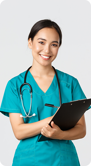 Female nurse holding a clipboard in a healthcare setting, supporting staffing solutions by Fluid Resourcing in care and community services