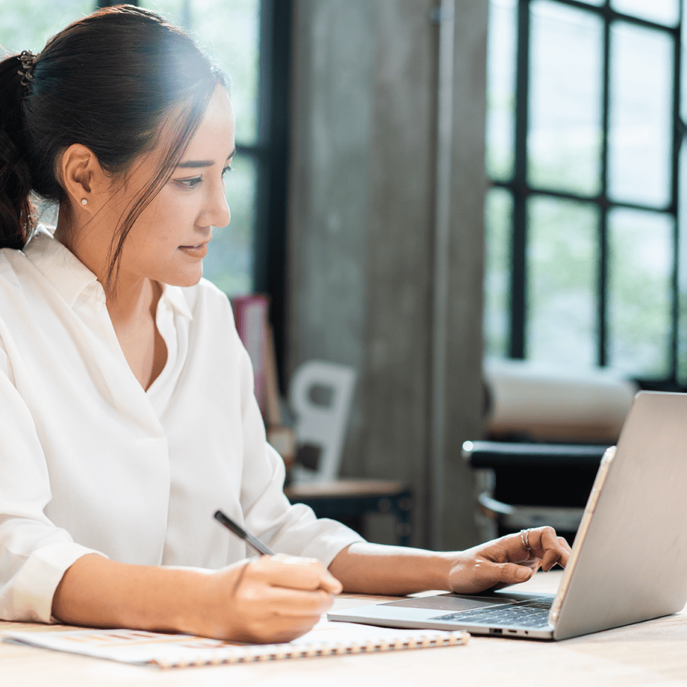 Virtual Roles for Small Business - Woman working remotely with a client