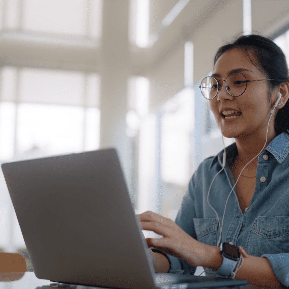 Remote Work Skills - Woman with a laptop working remotely